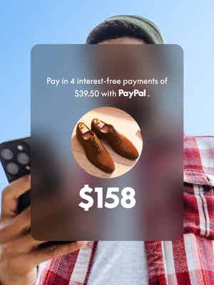 Photo of a person outside putting a smartphone in their pocket with a graphic of a payment plan for a pair of $158 dress shoes